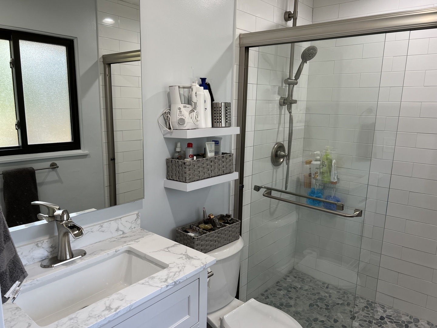 2050 Beechnut Road Northbrook, IL 60062 - Photo 9 of 18 a bathroom with a sink toilet and shower
