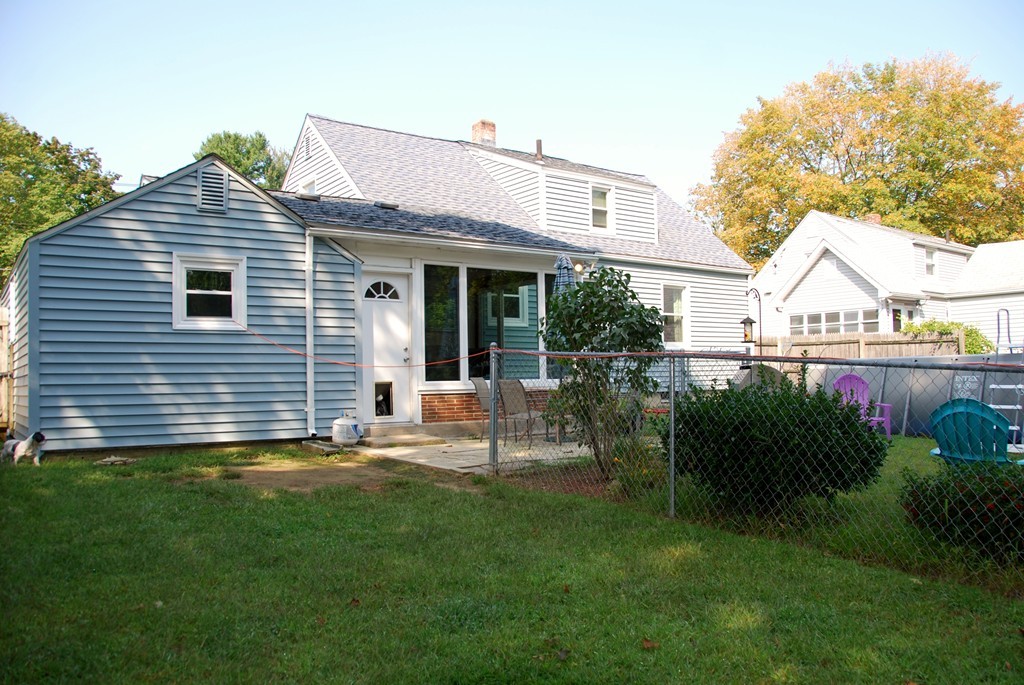 39 Lumae Street Springfield, MA 01119 - Photo 22 of 26 a view of a house with a yard and sitting area