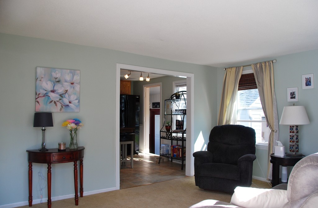 39 Lumae Street Springfield, MA 01119 - Photo 3 of 26 a living room with furniture and a window