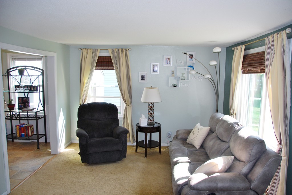 39 Lumae Street Springfield, MA 01119 - Photo 4 of 26 a living room with furniture and a window