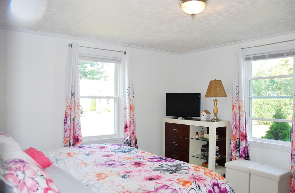39 Lumae Street Springfield, MA 01119 - Photo 10 of 26 a bedroom with a bed and a window