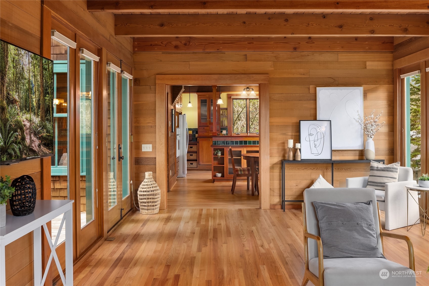 8251 Northeast Beck Road Bainbridge Island, WA 98110 - Photo 13 of 40 a living room with furniture and a wooden floor