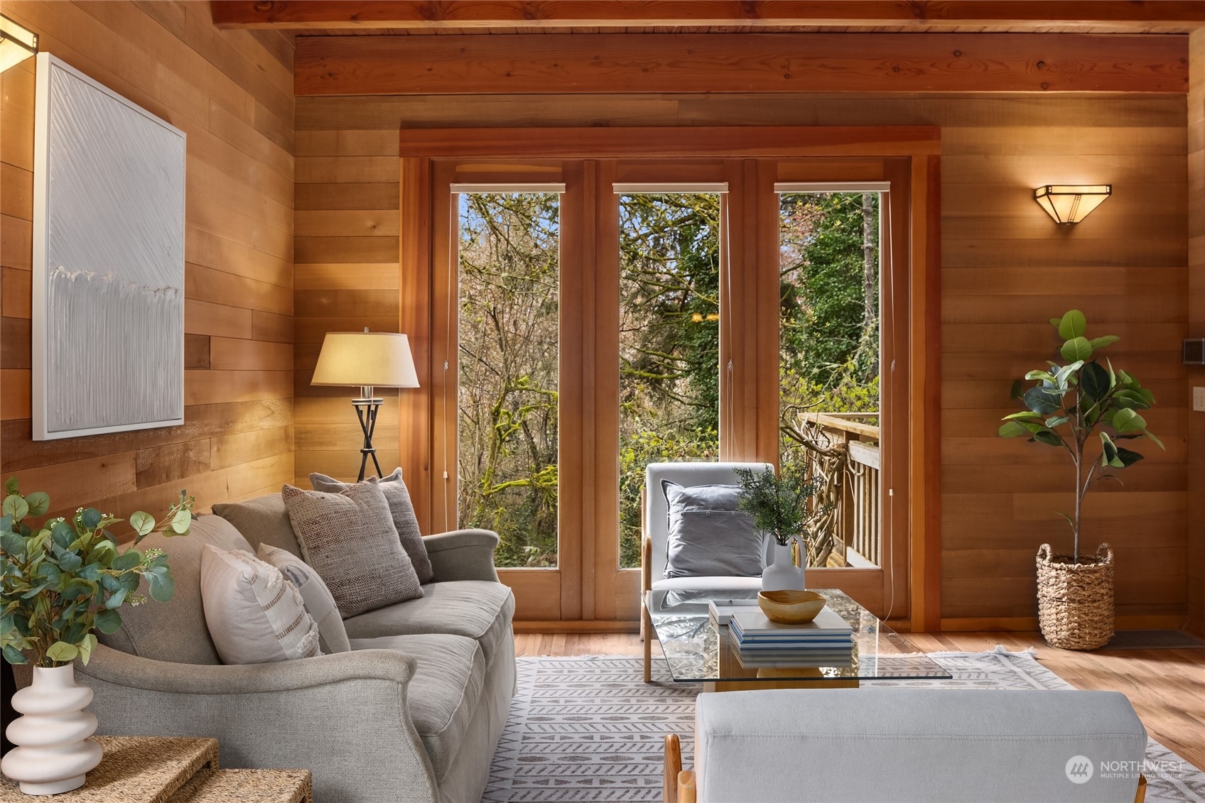 8251 Northeast Beck Road Bainbridge Island, WA 98110 - Photo 17 of 40 a living room with furniture and a potted plant