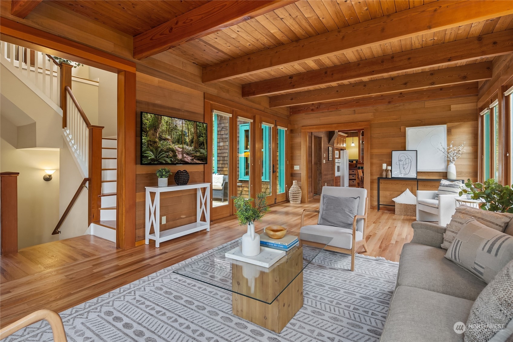 8251 Northeast Beck Road Bainbridge Island, WA 98110 - Photo 18 of 40 a living room with furniture a wooden floor and next to a large window