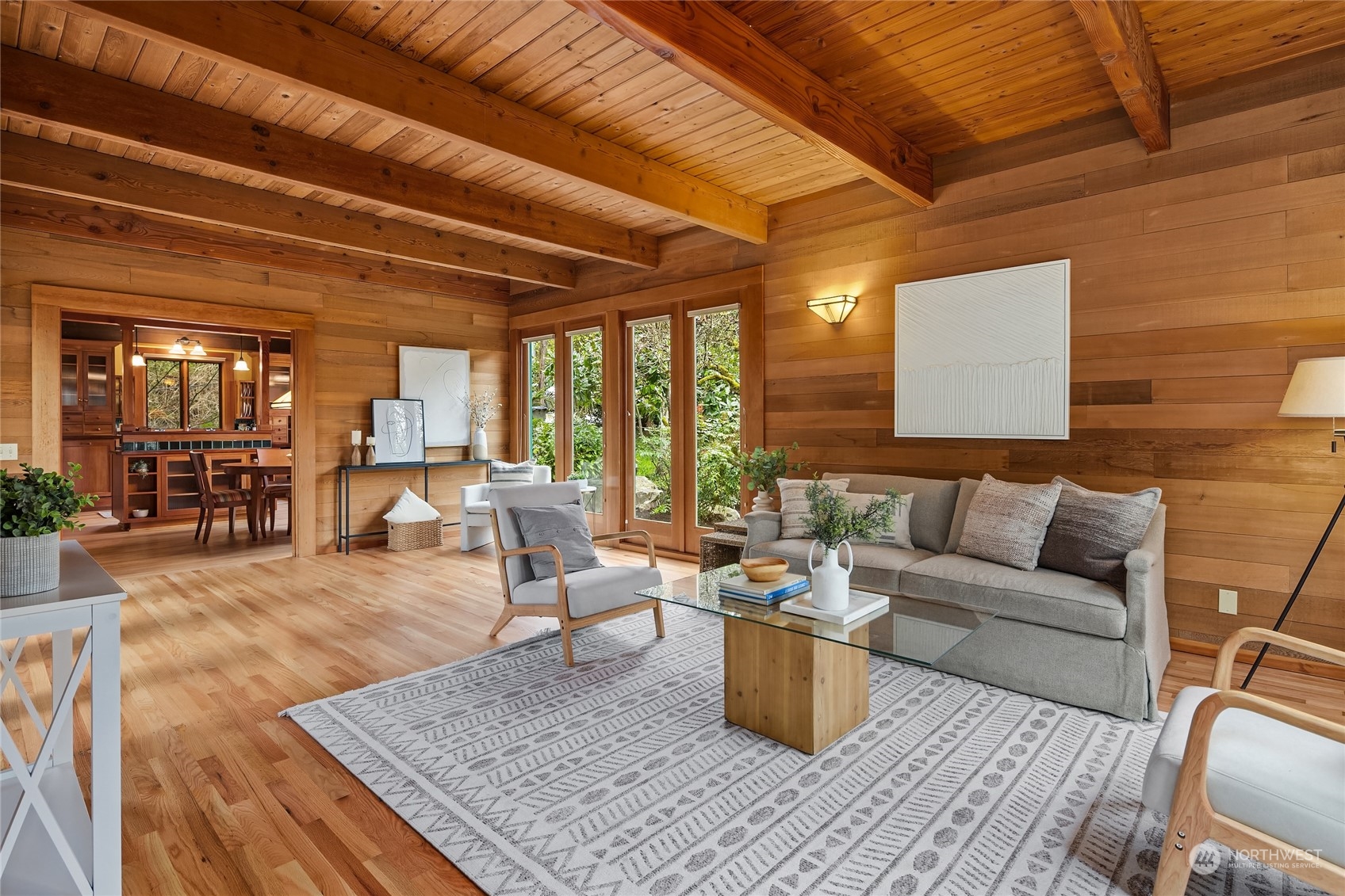 8251 Northeast Beck Road Bainbridge Island, WA 98110 - Photo 19 of 40 a living room with furniture wooden floor and a table