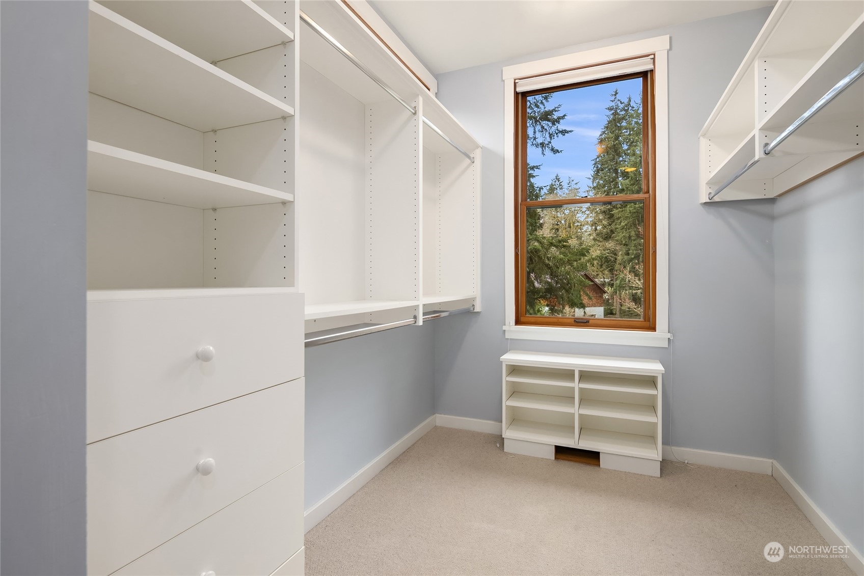 8251 Northeast Beck Road Bainbridge Island, WA 98110 - Photo 25 of 40 a view of an empty room with a window