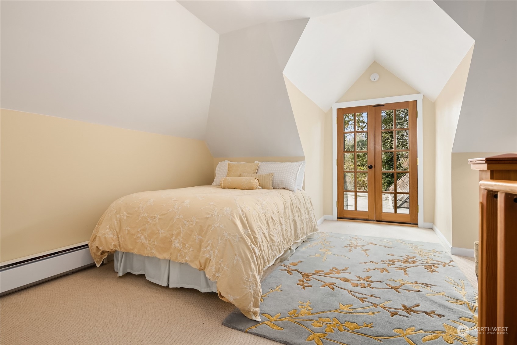 8251 Northeast Beck Road Bainbridge Island, WA 98110 - Photo 28 of 40 a bedroom with a bed and a window