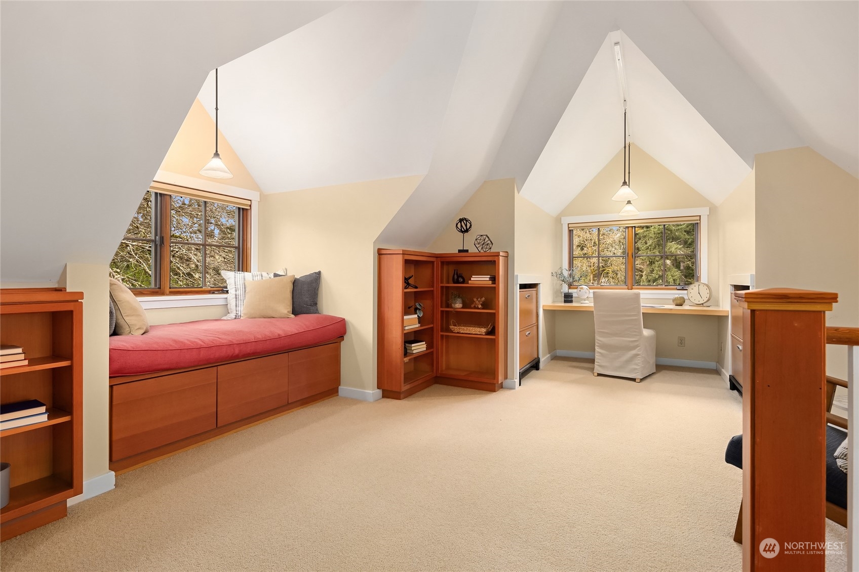 8251 Northeast Beck Road Bainbridge Island, WA 98110 - Photo 29 of 40 a bedroom with furniture and a bed