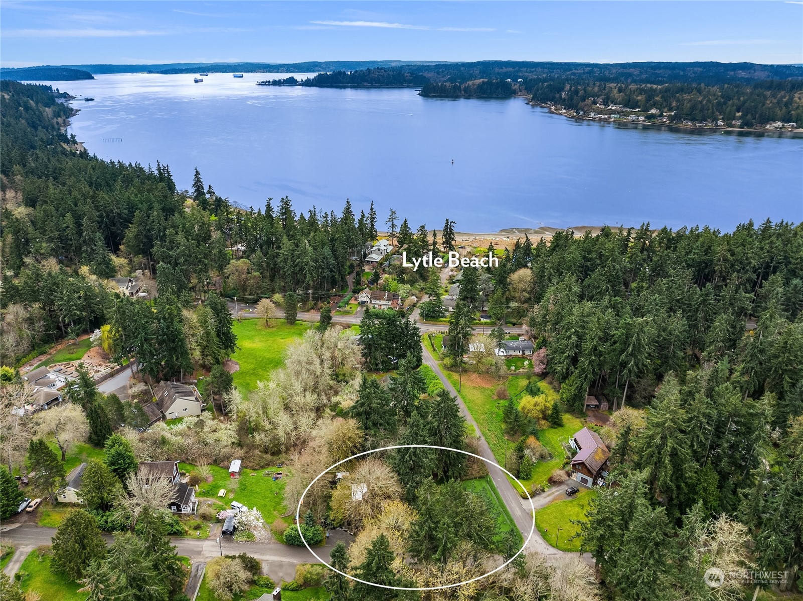 8251 Northeast Beck Road Bainbridge Island, WA 98110 - Photo 3 of 40 a view of a lake with a lake