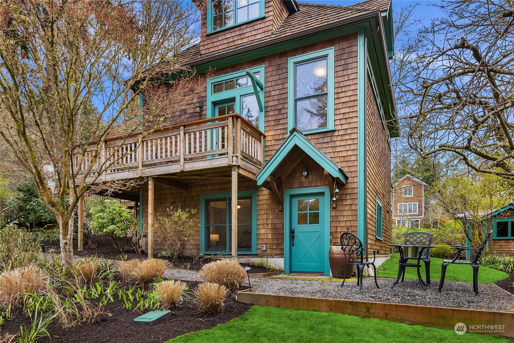 8251 Northeast Beck Road Bainbridge Island, WA 98110 - Photo 37 of 40 front view of a house with a yard
