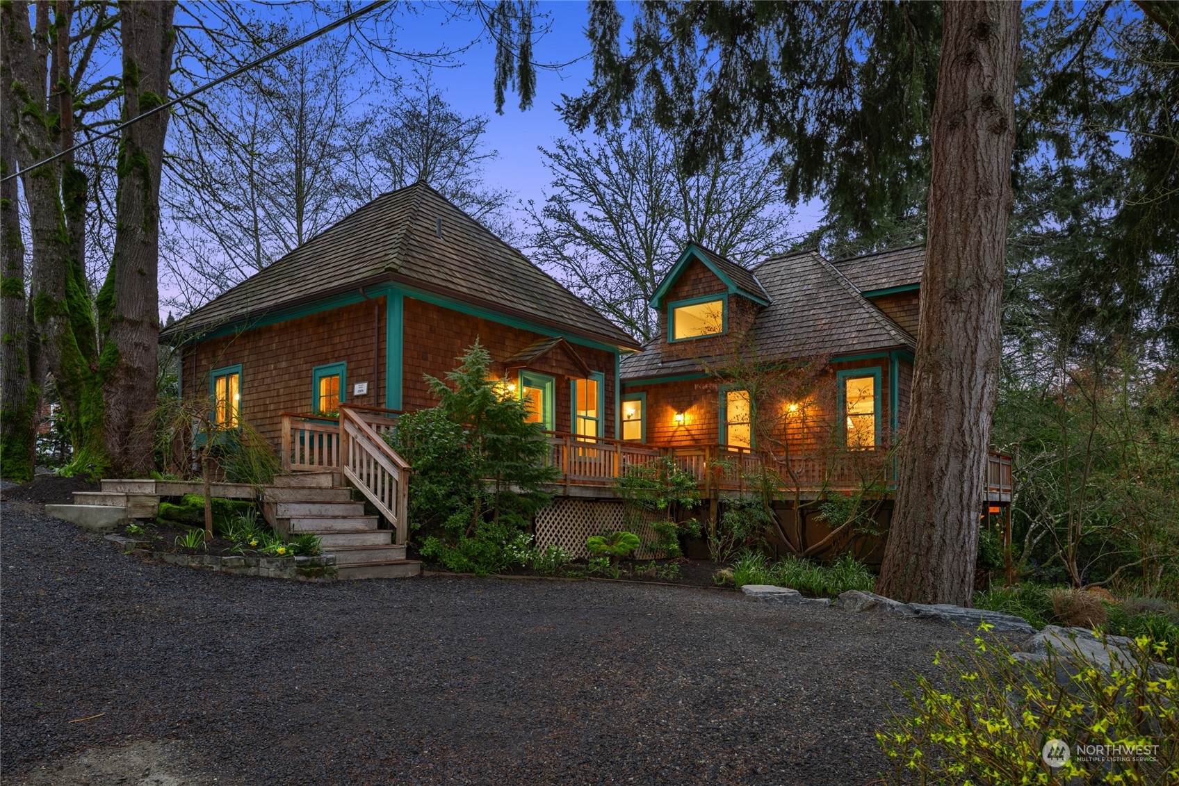 8251 Northeast Beck Road Bainbridge Island, WA 98110 - Photo 39 of 40 a front view of a house with garden