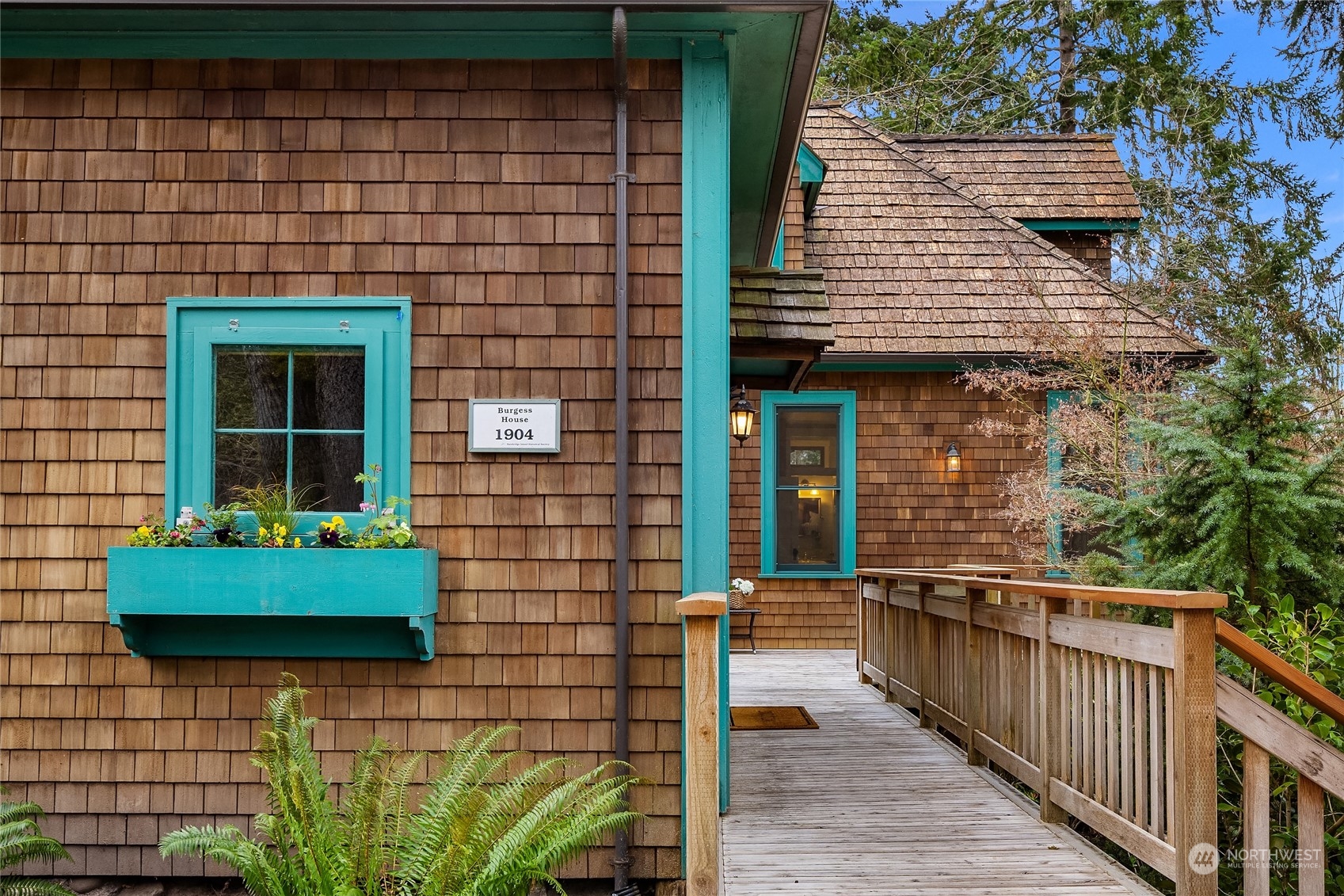 8251 Northeast Beck Road Bainbridge Island, WA 98110 - Photo 5 of 40 a view of a house with backyard and porch