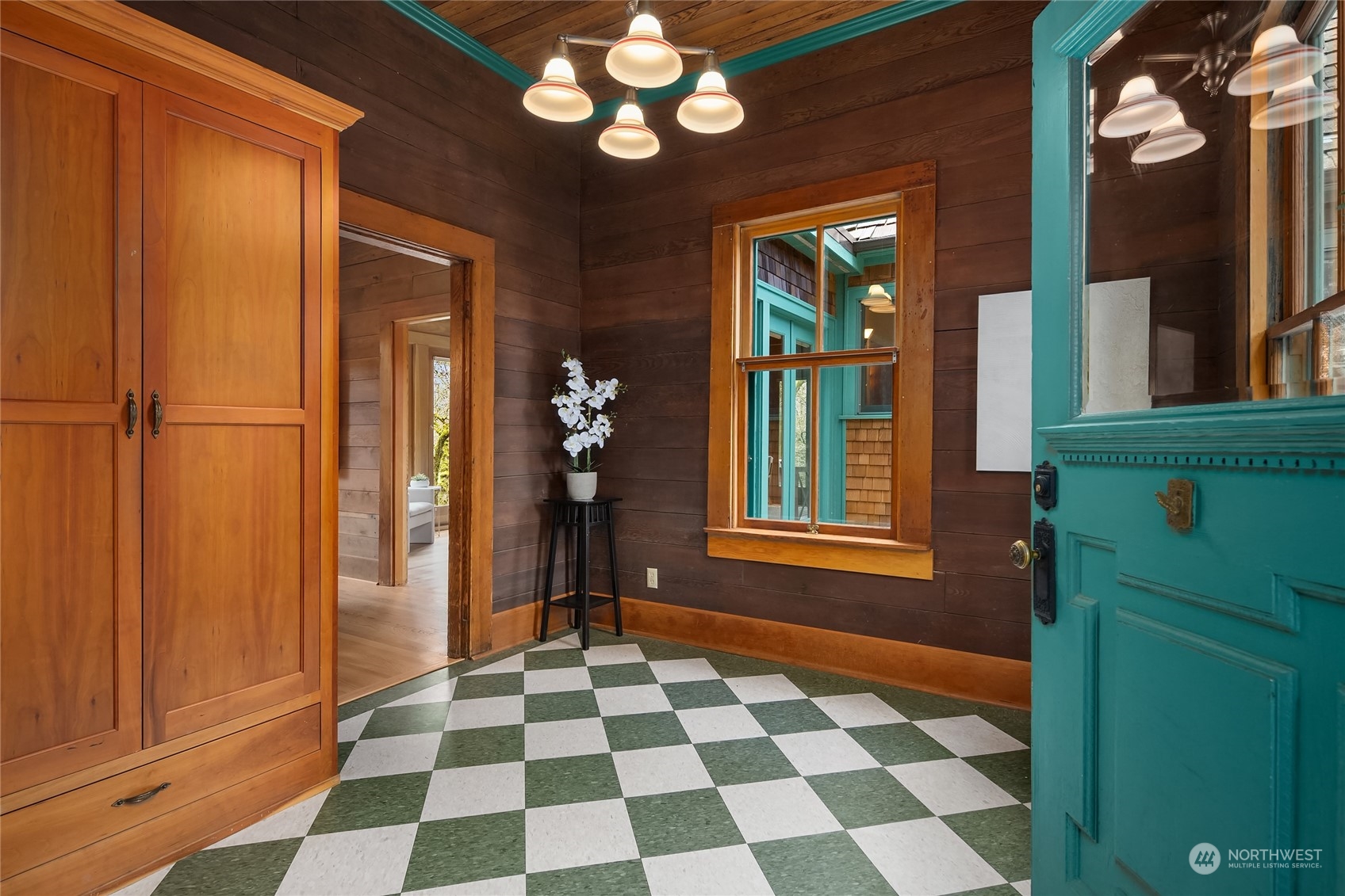 8251 Northeast Beck Road Bainbridge Island, WA 98110 - Photo 6 of 40 a black and white checkered floor with a large window