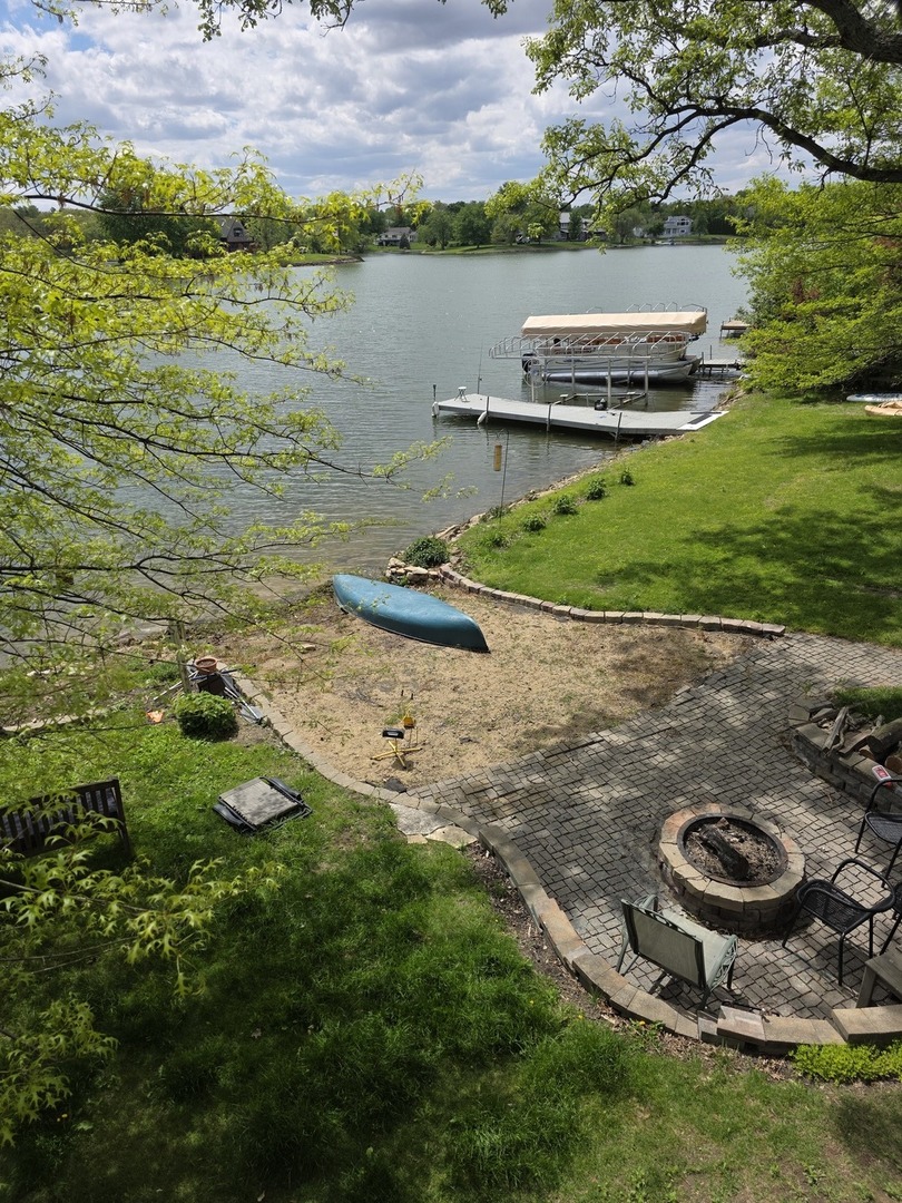 107 Comanche Trail Loda, IL 60948 - Photo 30 of 37 a view of a lake with outdoor space