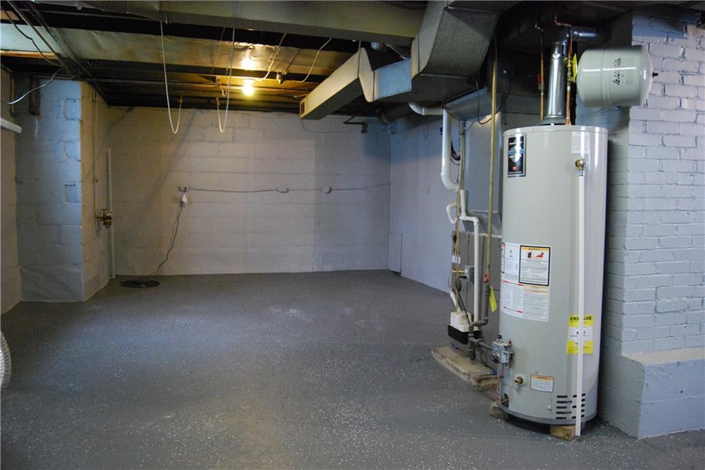 62 Coraopolis Road Coraopolis, PA 15108 - Photo 22 of 25 Large, unfinished dry basement. Notice the one of new sump pumps.
