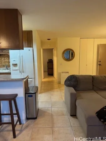 a living room with a couch and a table in it