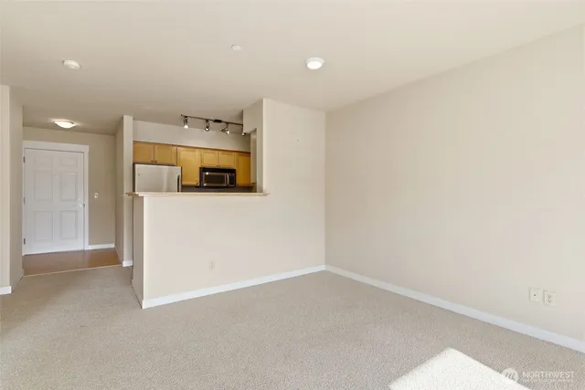 a view of a room with a hallway