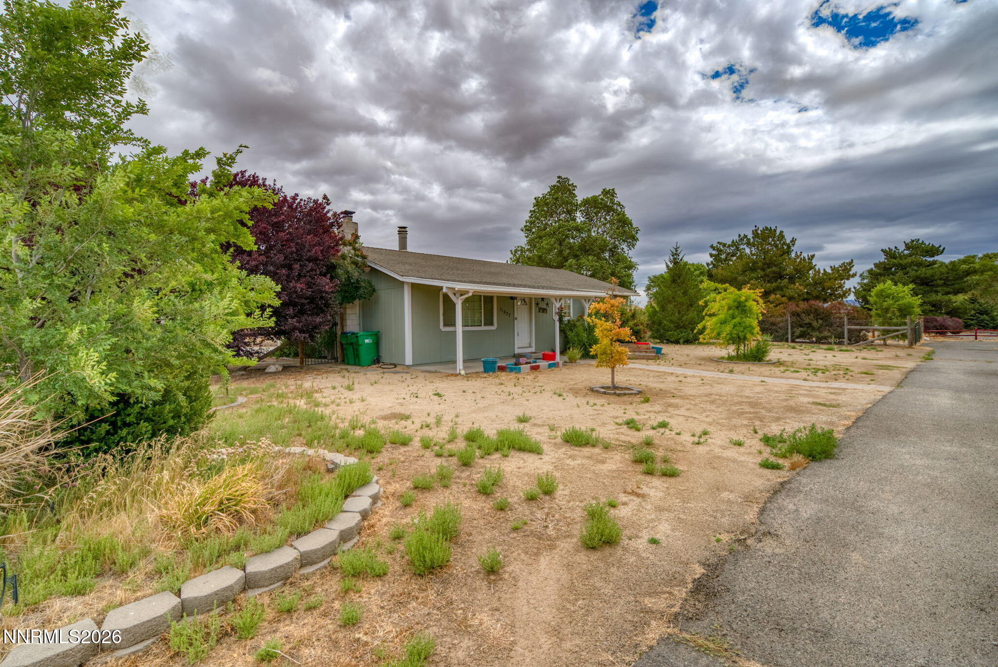 11577 Deodar Way Reno, NV 89506 - Photo 9 of 58 a view of house with yard