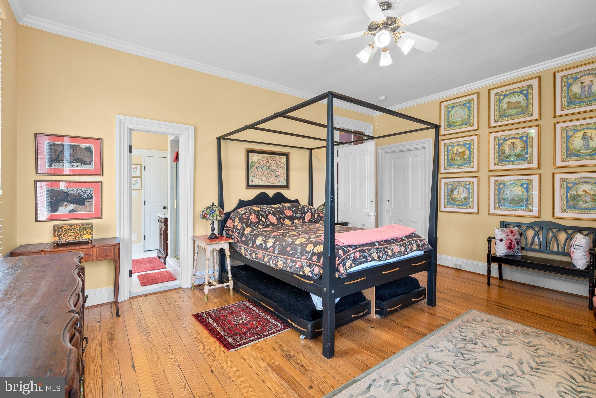 15701 Dr Bowen Road Aquasco, MD 20608 - Photo 29 of 89 a bedroom with a bed and wooden floor