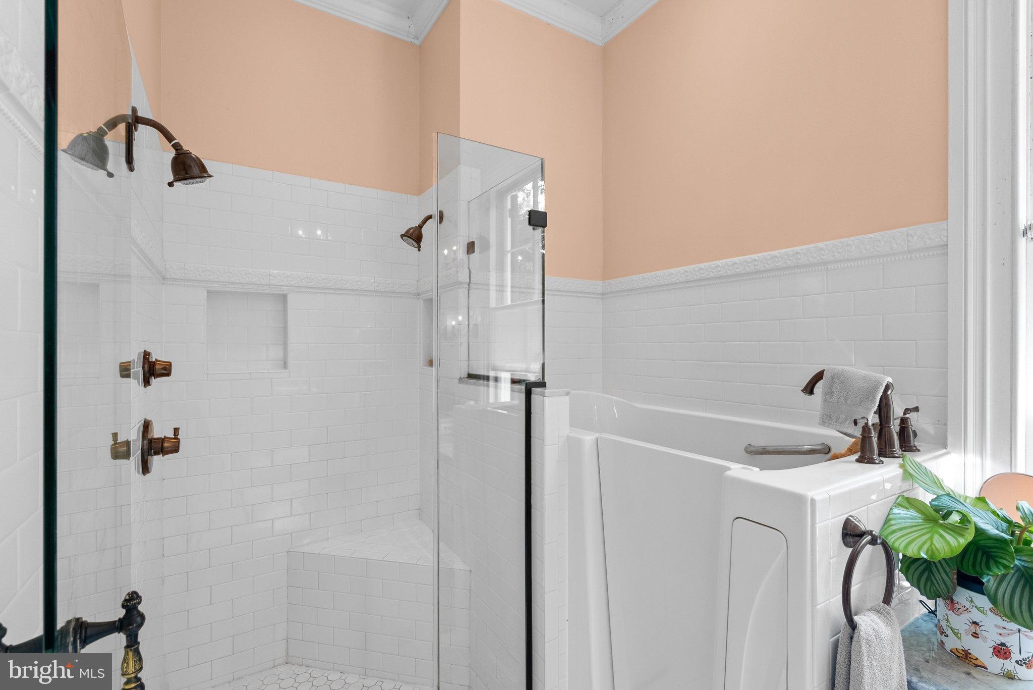 15701 Dr Bowen Road Aquasco, MD 20608 - Photo 36 of 89 a bathroom with a sink a toilet and shower