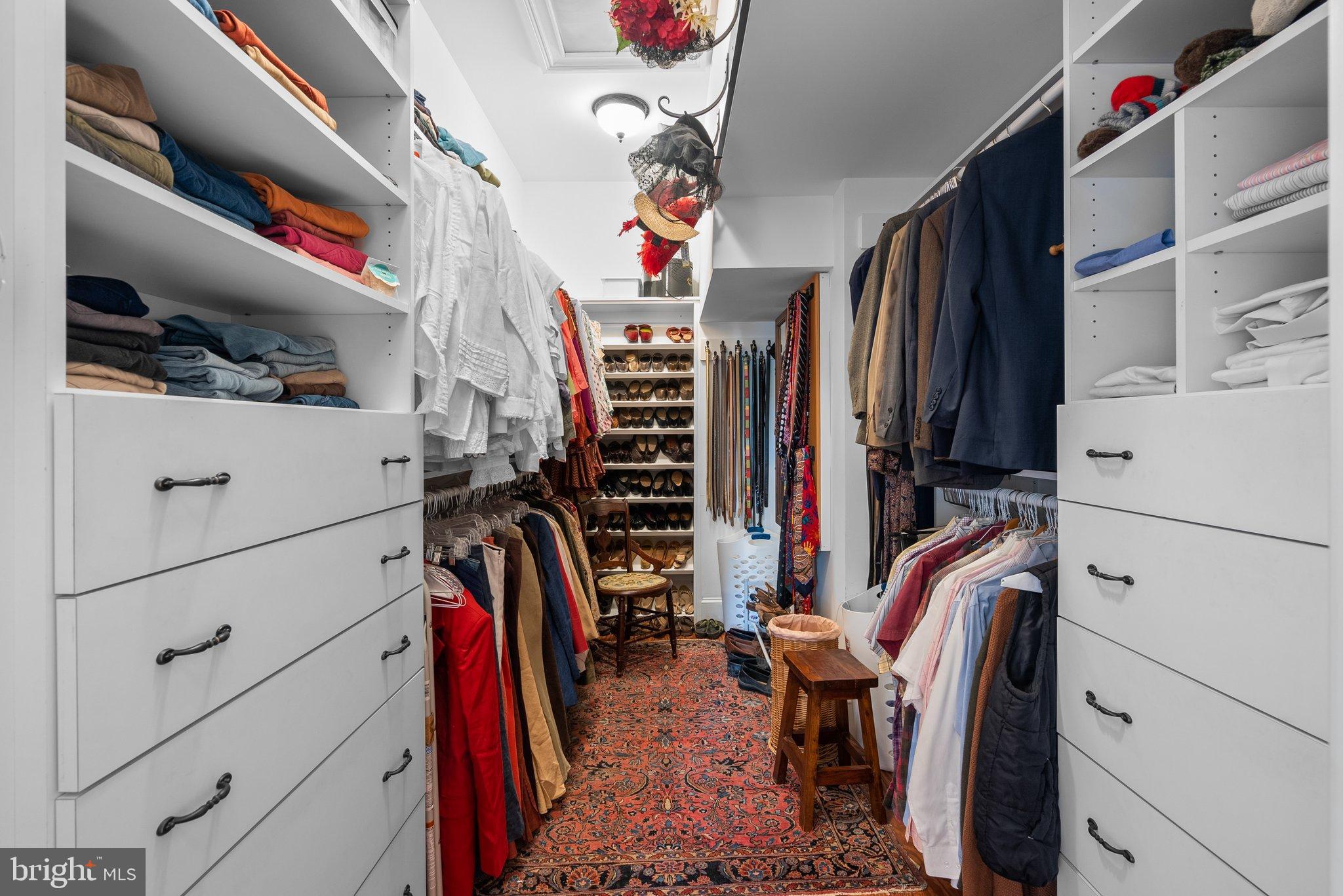 15701 Dr Bowen Road Aquasco, MD 20608 - Photo 37 of 89 a view of walk in closet with clothes and shoes