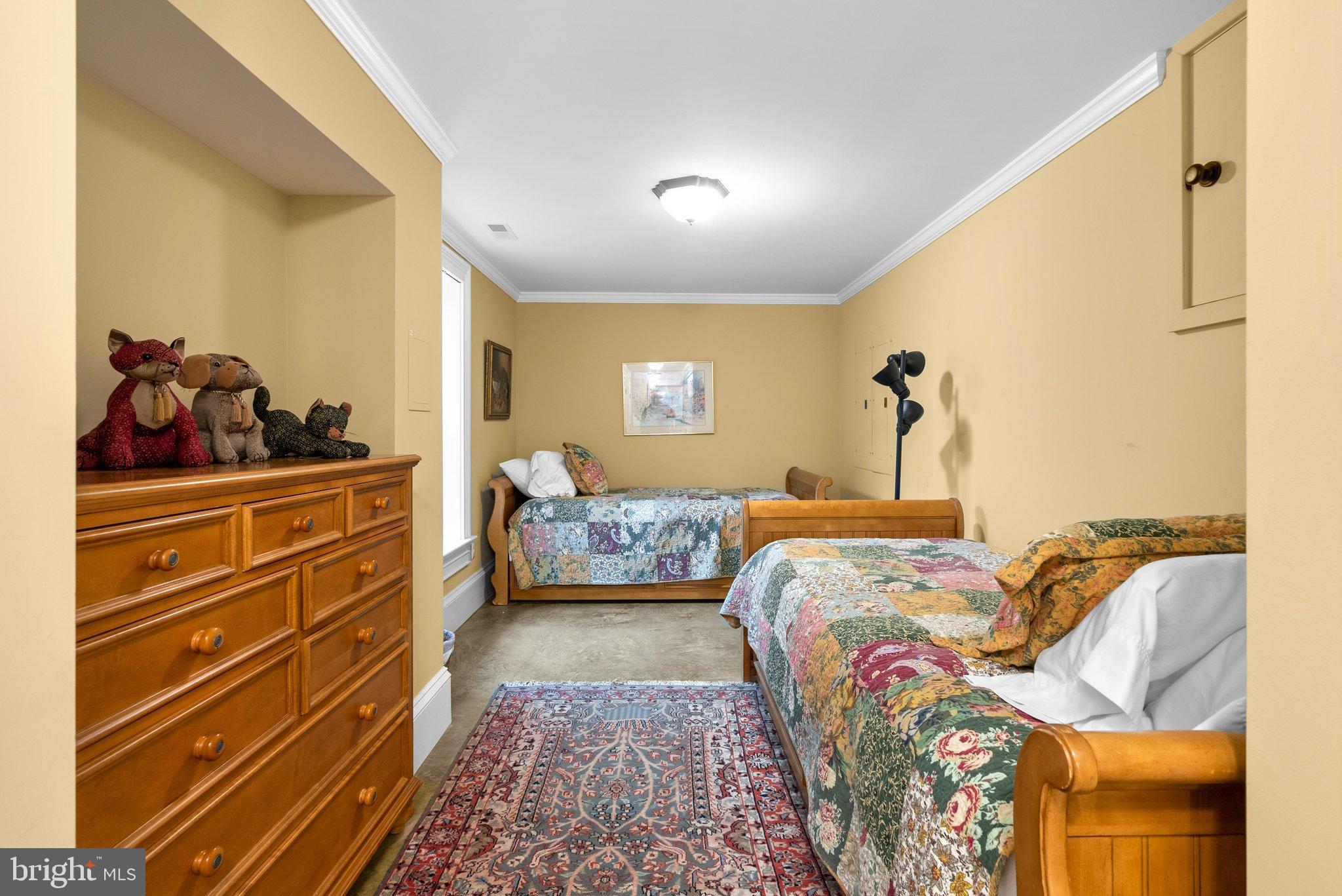 15701 Dr Bowen Road Aquasco, MD 20608 - Photo 51 of 89 a bed room with a bed and a dresser