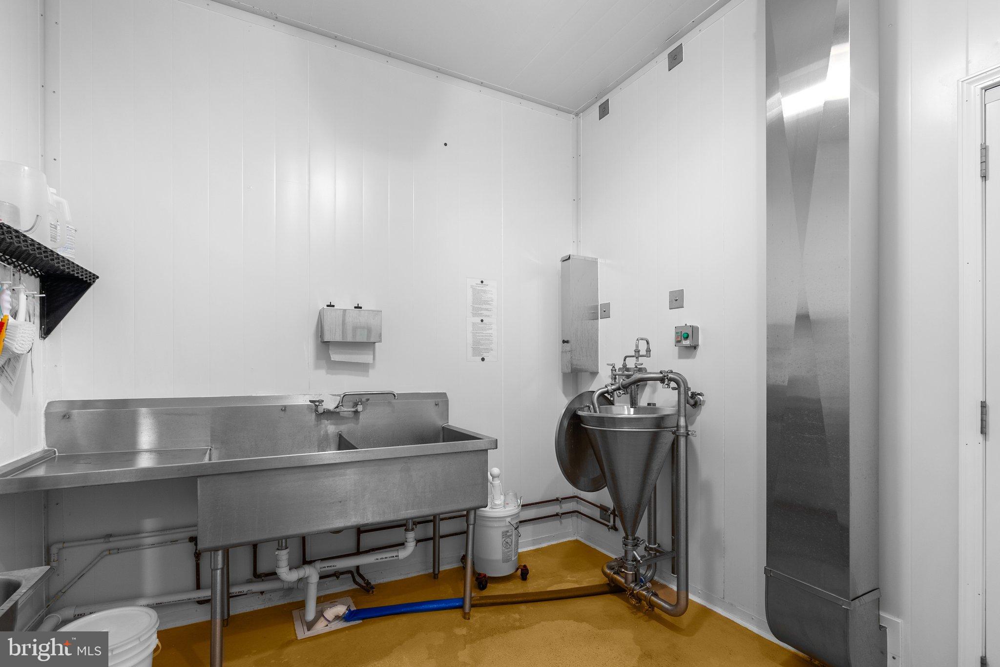 15701 Dr Bowen Road Aquasco, MD 20608 - Photo 65 of 89 a room with a washing machine and air hockey table