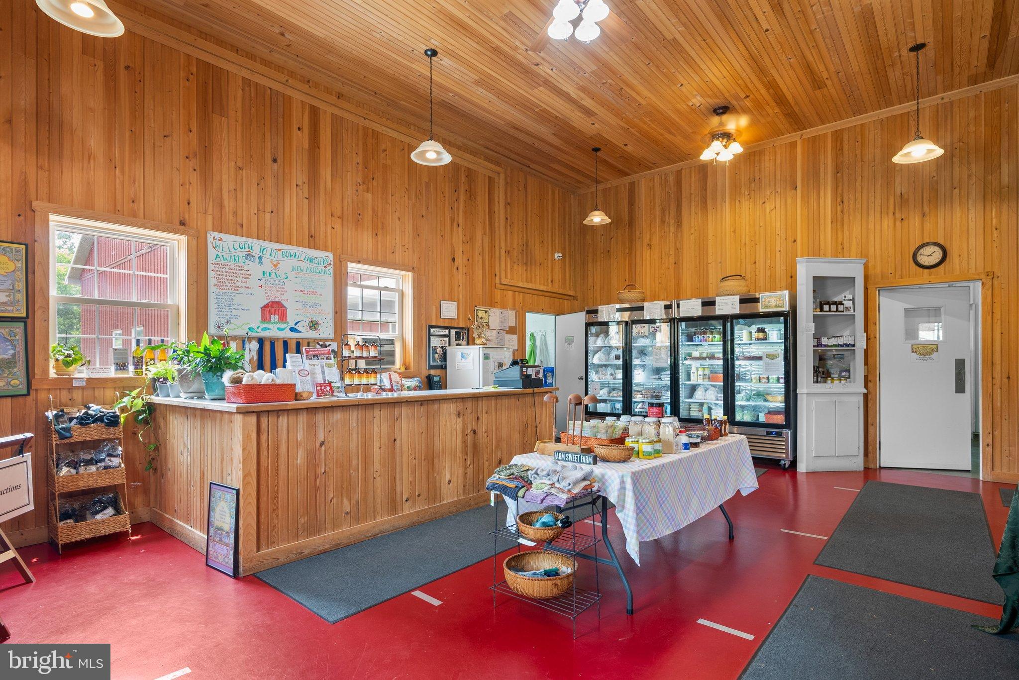 15701 Dr Bowen Road Aquasco, MD 20608 - Photo 74 of 89 a living room with furniture a rug and a large window