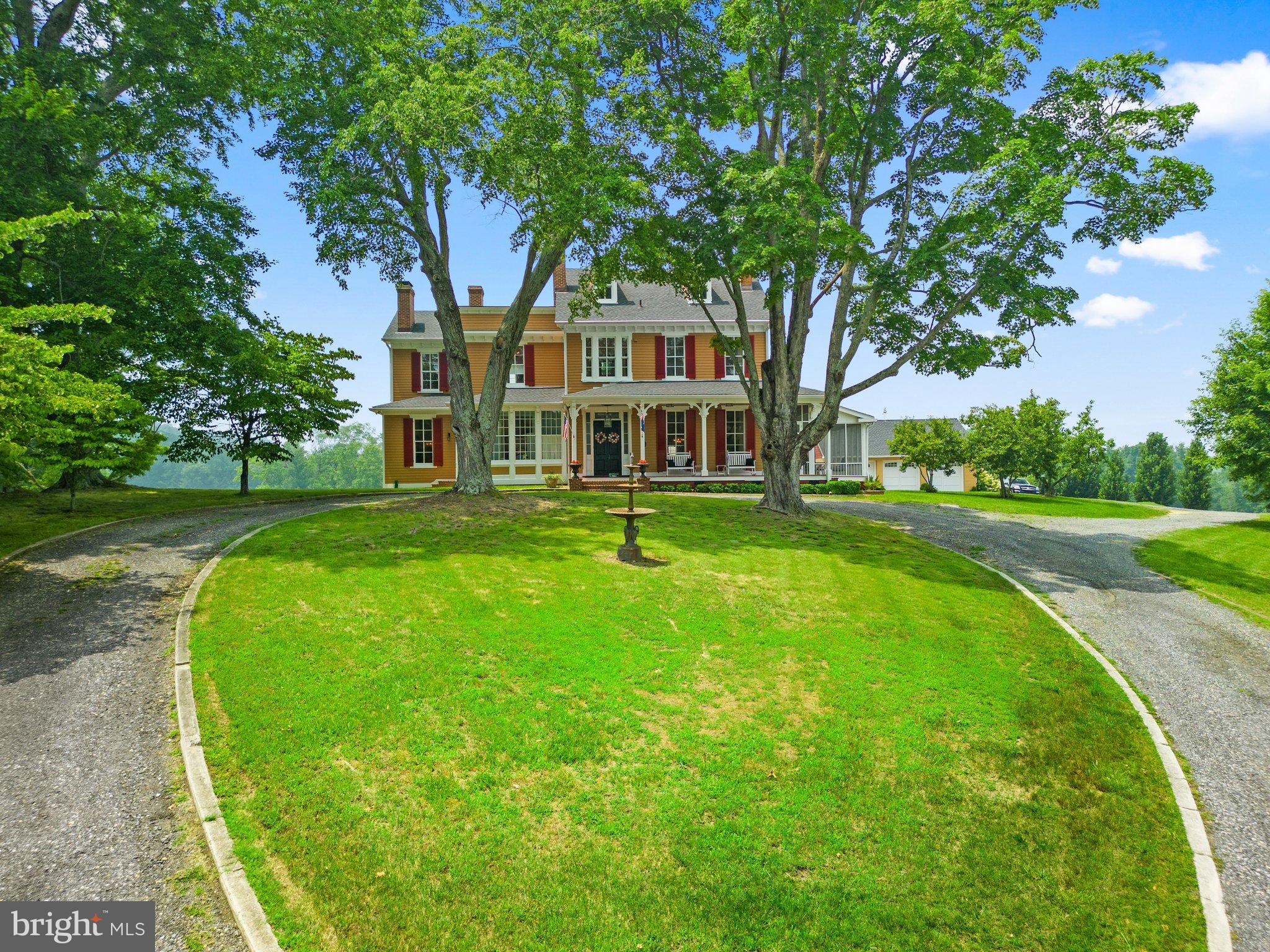 15701 Dr Bowen Road Aquasco, MD 20608 - Photo 8 of 89 a front view of a house with garden and trees