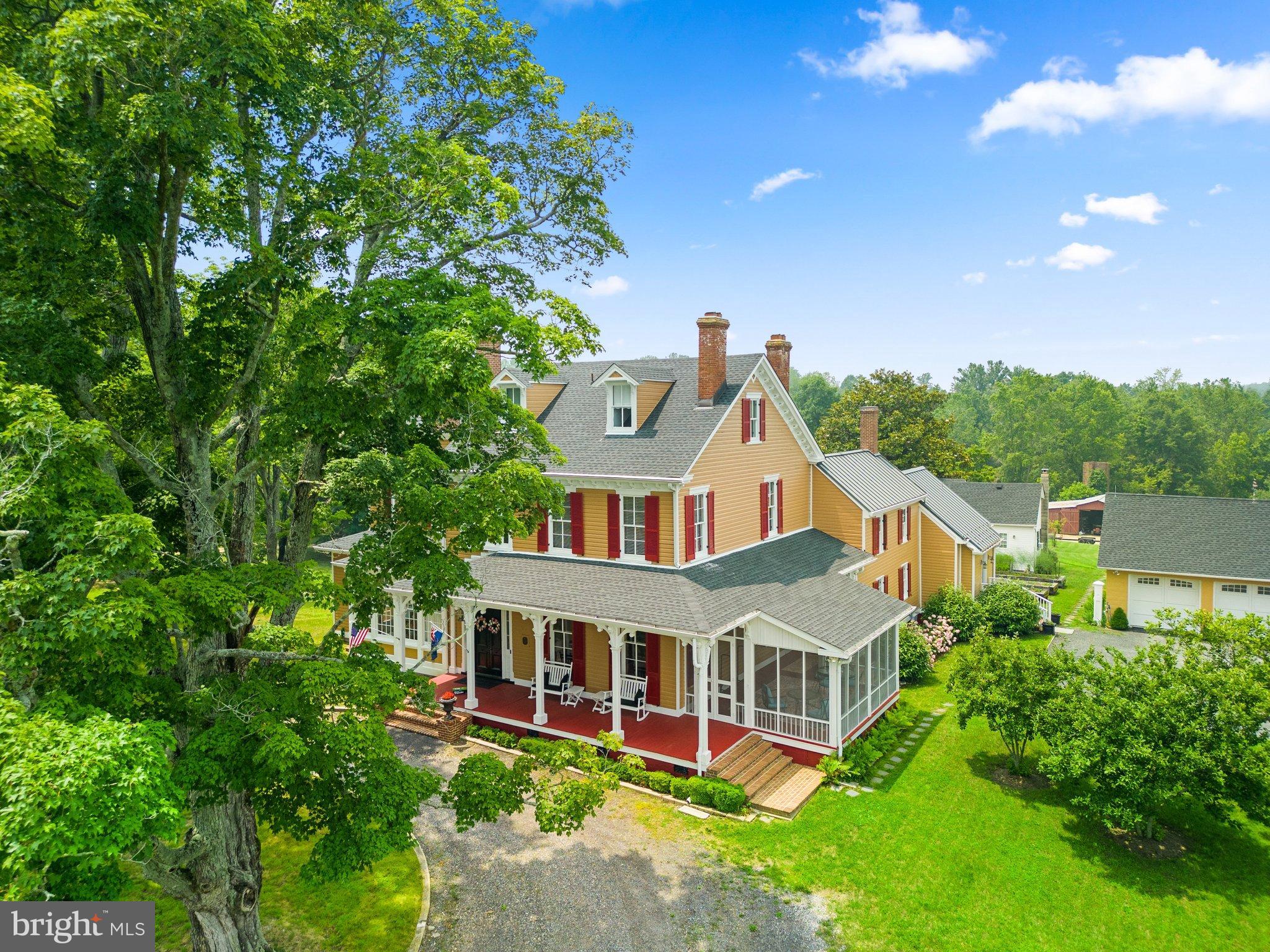 15701 Dr Bowen Road Aquasco, MD 20608 - Photo 76 of 89 aerial view of a house with a big yard plants and large trees