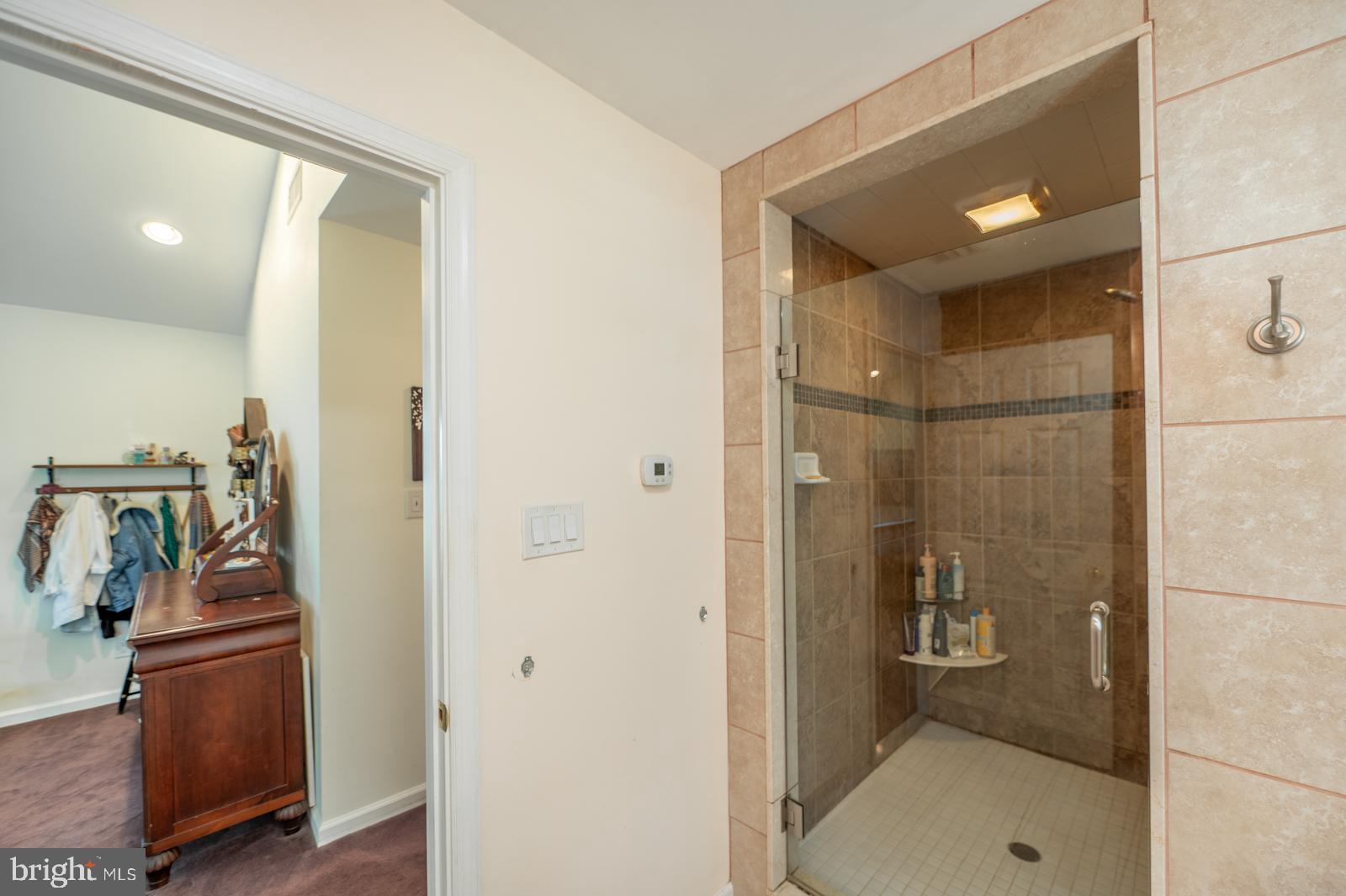 22 Salisbury Lane Malvern, PA 19355 - Photo 21 of 57 a bathroom with a shower