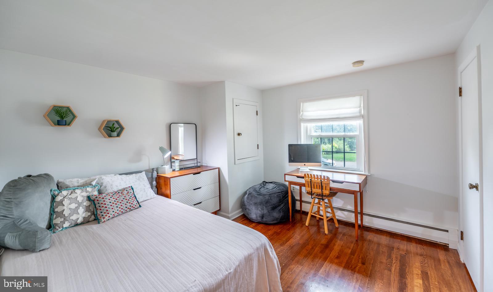 22 Salisbury Lane Malvern, PA 19355 - Photo 25 of 57 a bedroom with two bed and a wooden floor
