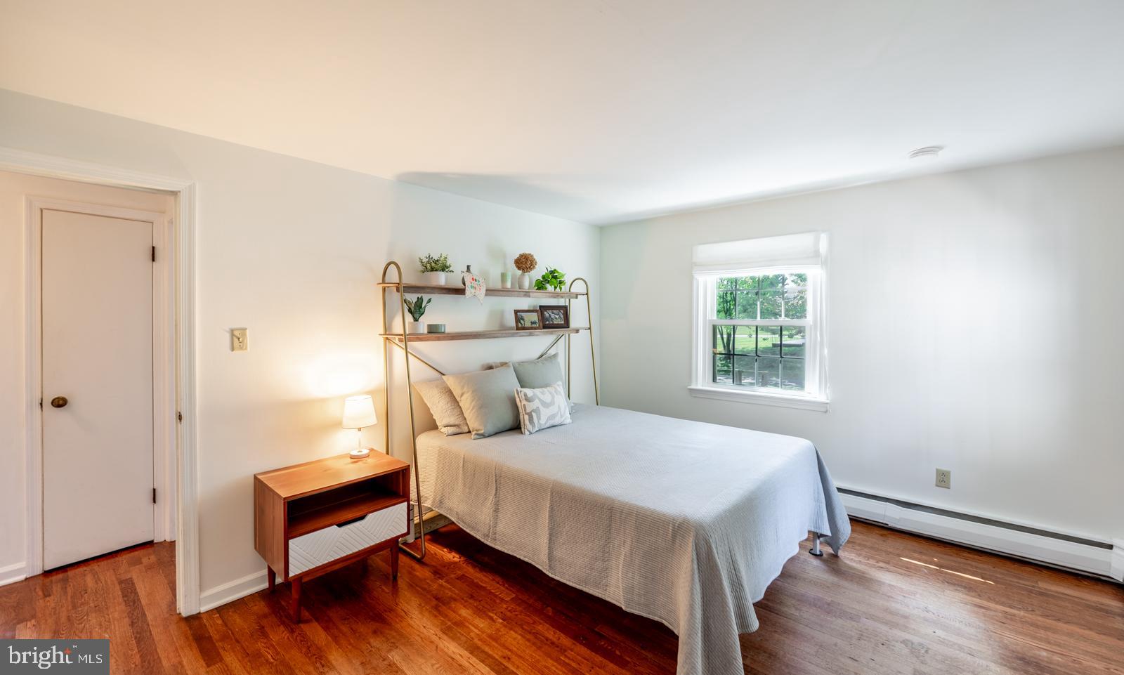 22 Salisbury Lane Malvern, PA 19355 - Photo 27 of 57 a bedroom with a bed and a window