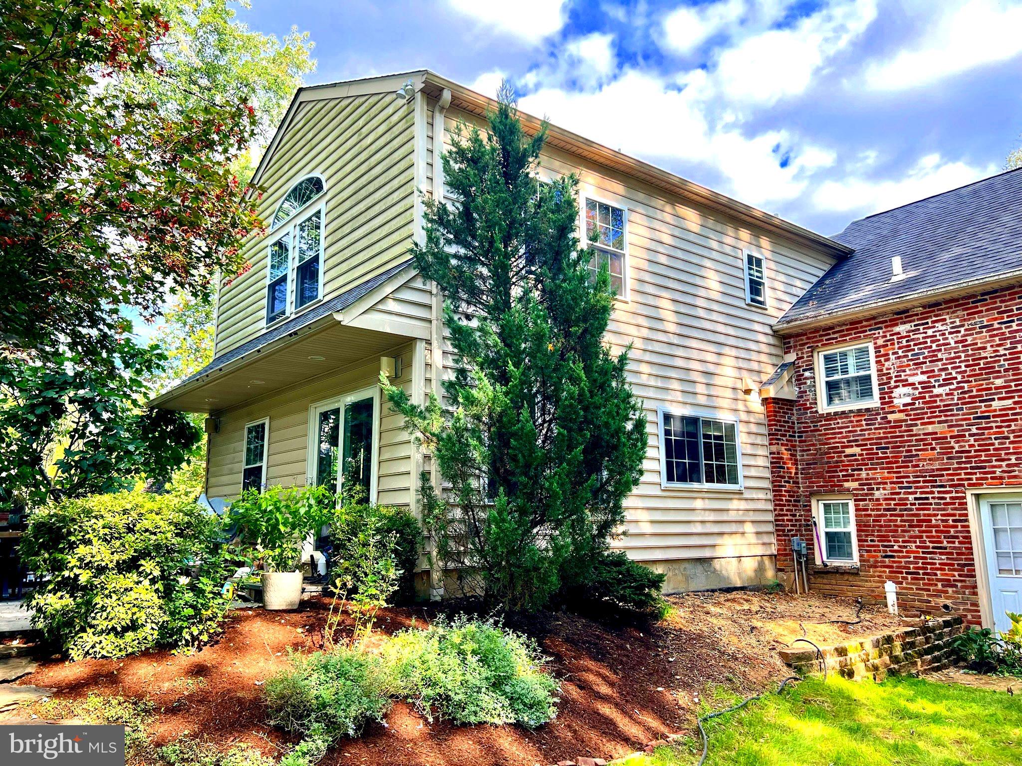 22 Salisbury Lane Malvern, PA 19355 - Photo 3 of 57 a front view of a house with garden