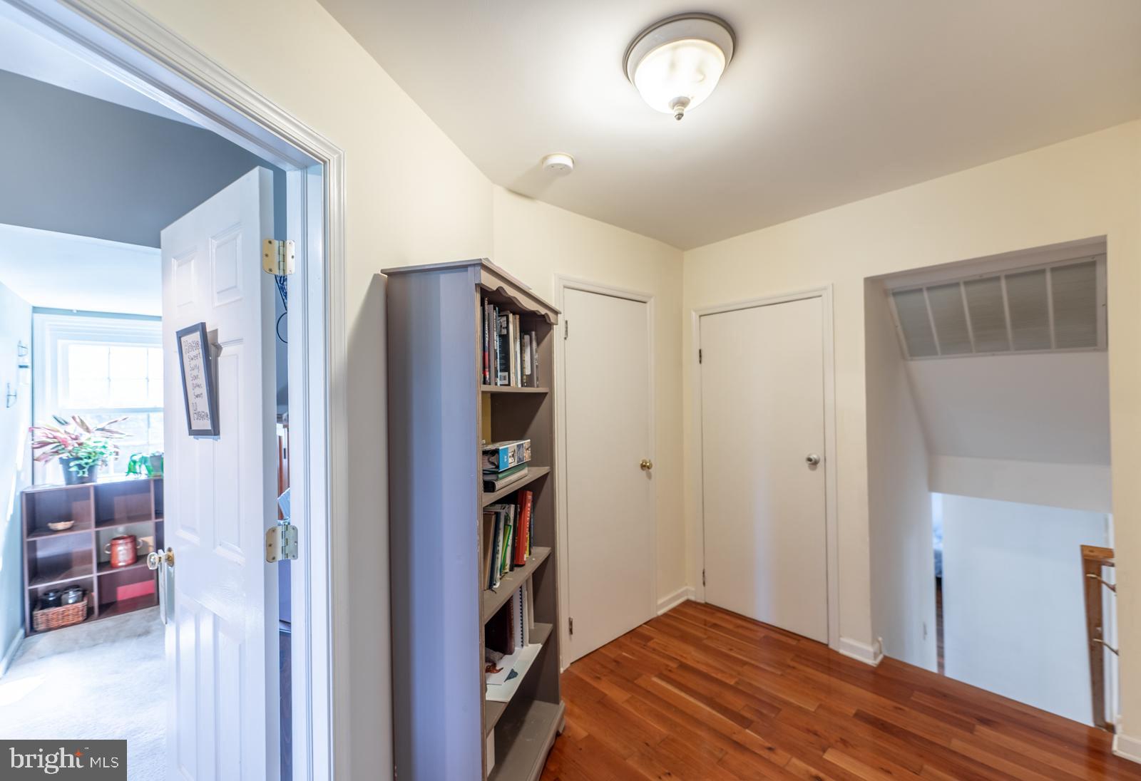 22 Salisbury Lane Malvern, PA 19355 - Photo 33 of 57 a bedroom with a bed and a book shelf