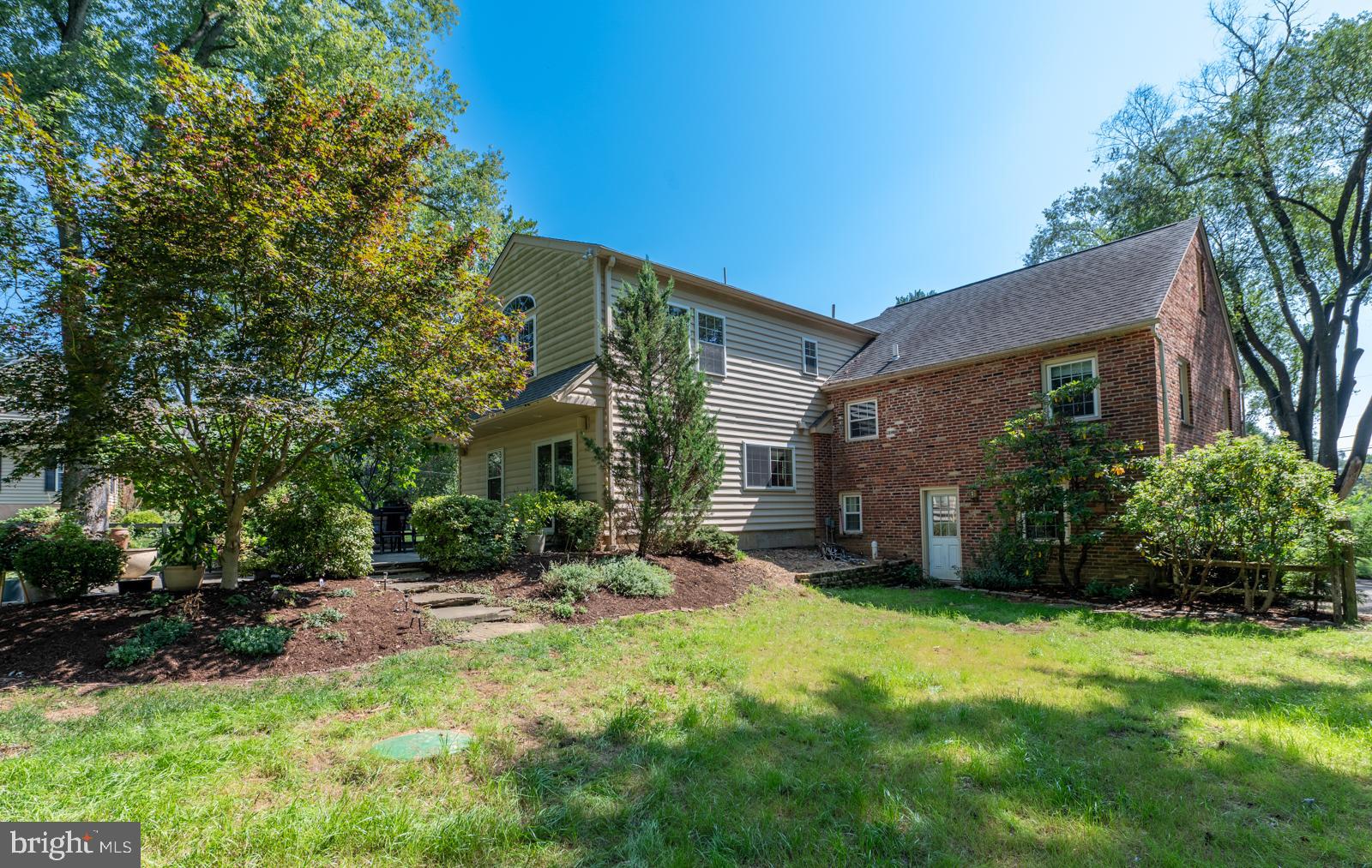 22 Salisbury Lane Malvern, PA 19355 - Photo 4 of 57 a view of a house with backyard and sitting area
