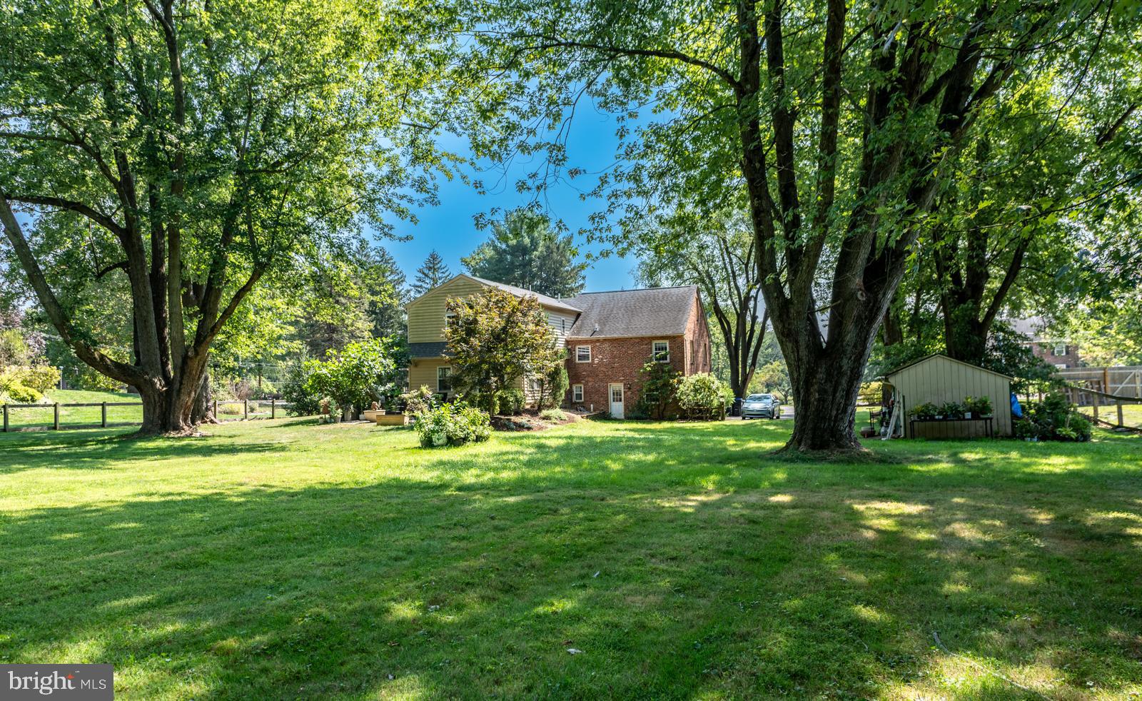 22 Salisbury Lane Malvern, PA 19355 - Photo 42 of 57 a view of a big yard with plants and large trees