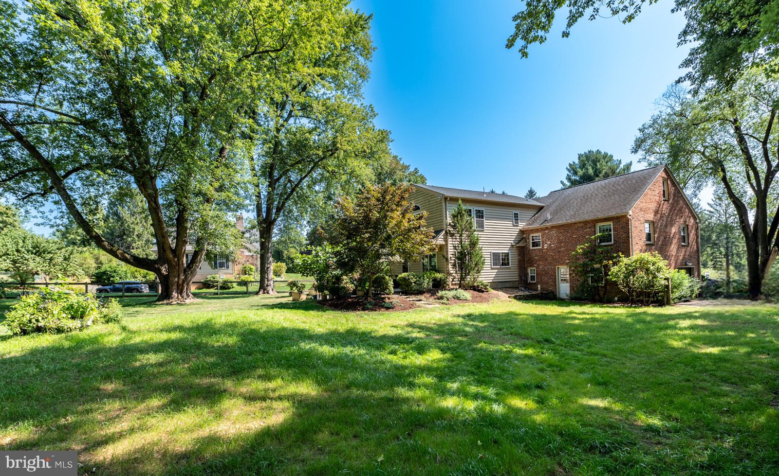 22 Salisbury Lane Malvern, PA 19355 - Photo 43 of 57 a view of a house with a big yard and large trees