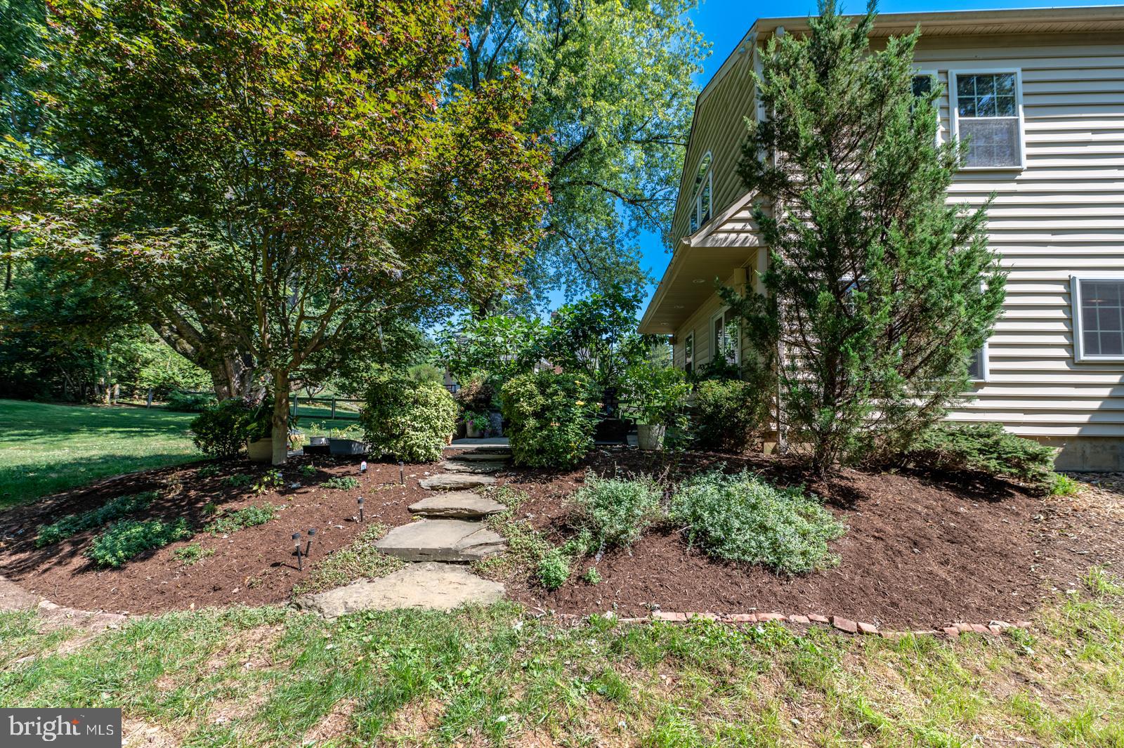 22 Salisbury Lane Malvern, PA 19355 - Photo 45 of 57 a backyard of a house with lots of green space