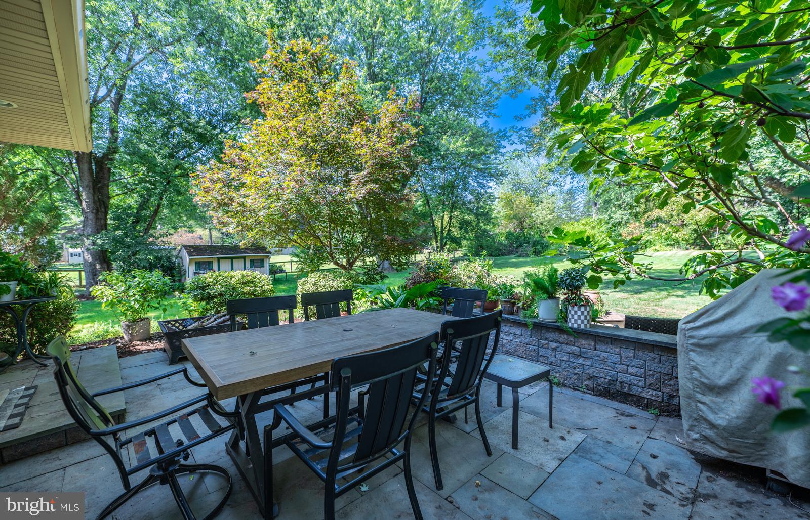 22 Salisbury Lane Malvern, PA 19355 - Photo 46 of 57 a view of an outside dining space with a table and chairs