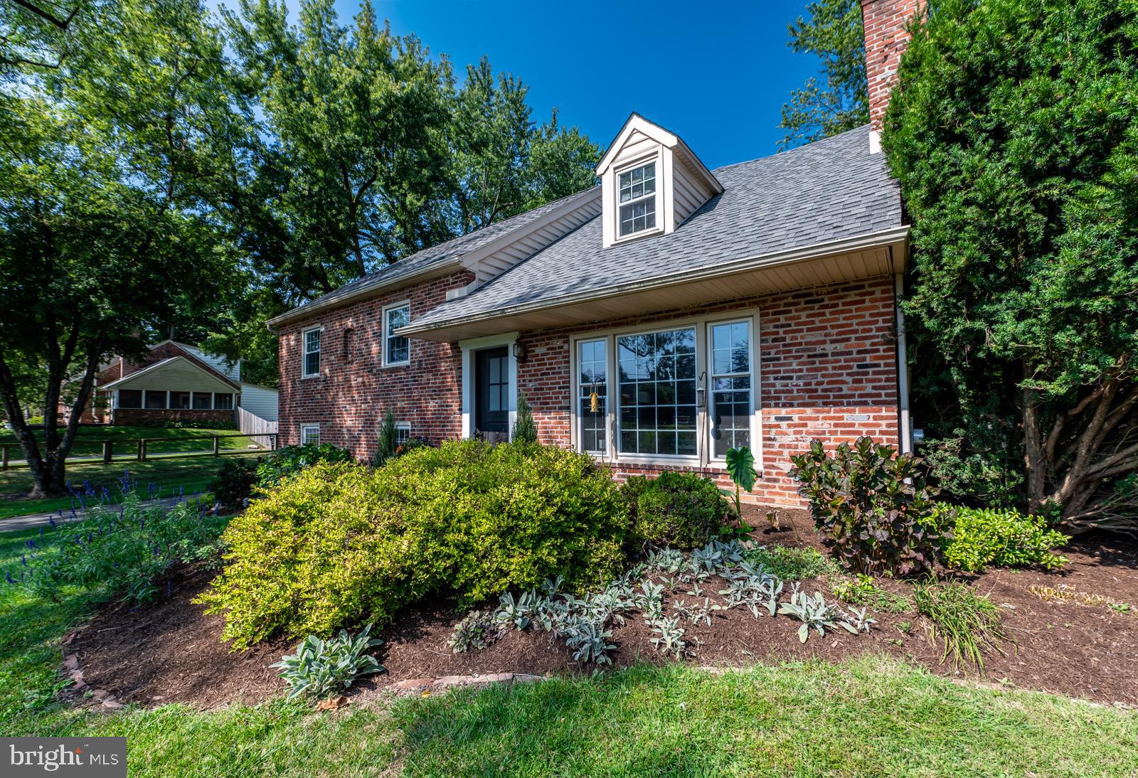 22 Salisbury Lane Malvern, PA 19355 - Photo 50 of 57 a front view of a house with garden