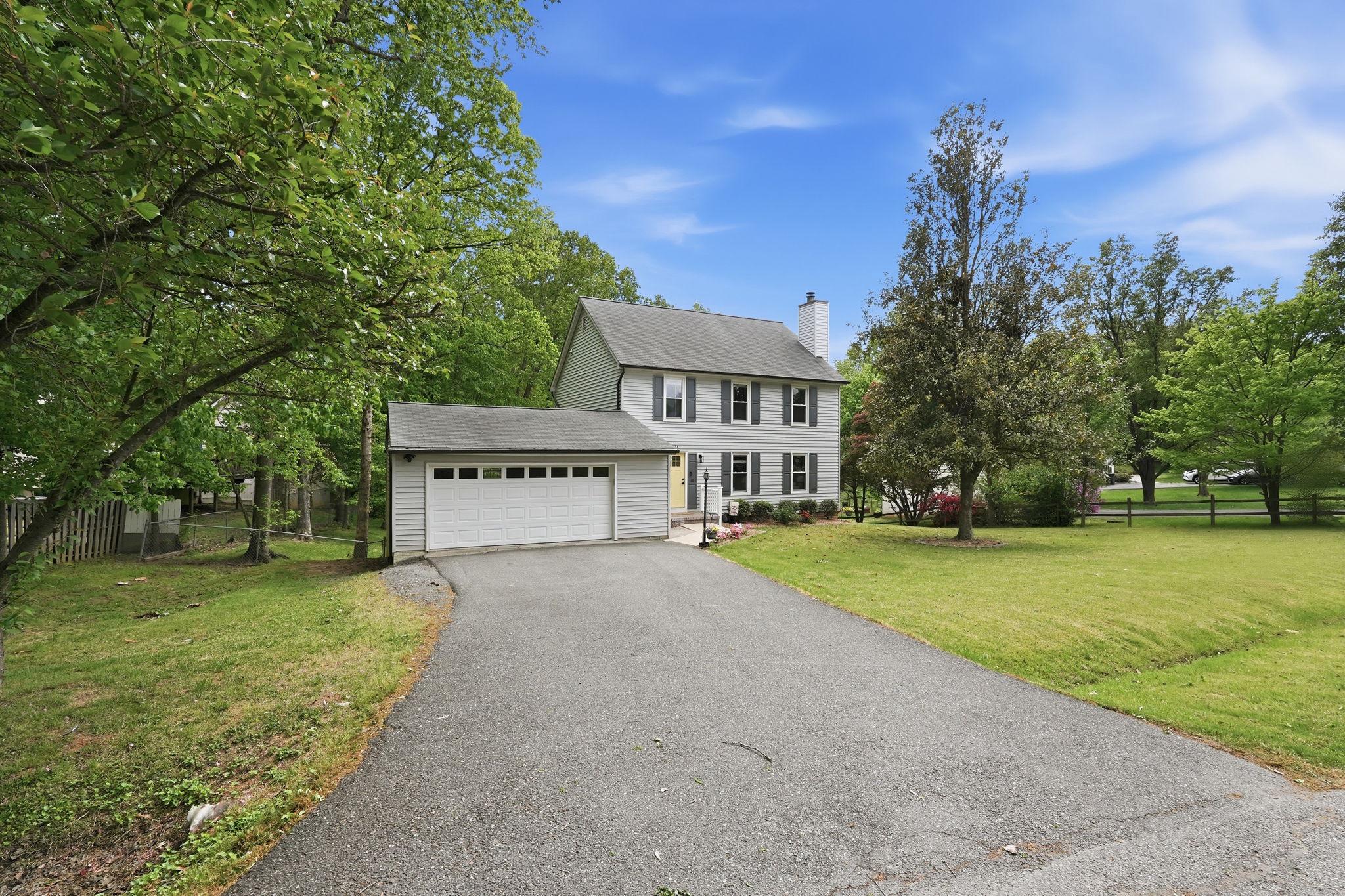 124 Oaklawn Road Stafford, VA 22554 - Photo 2 of 36 a view of house with outdoor space and trees