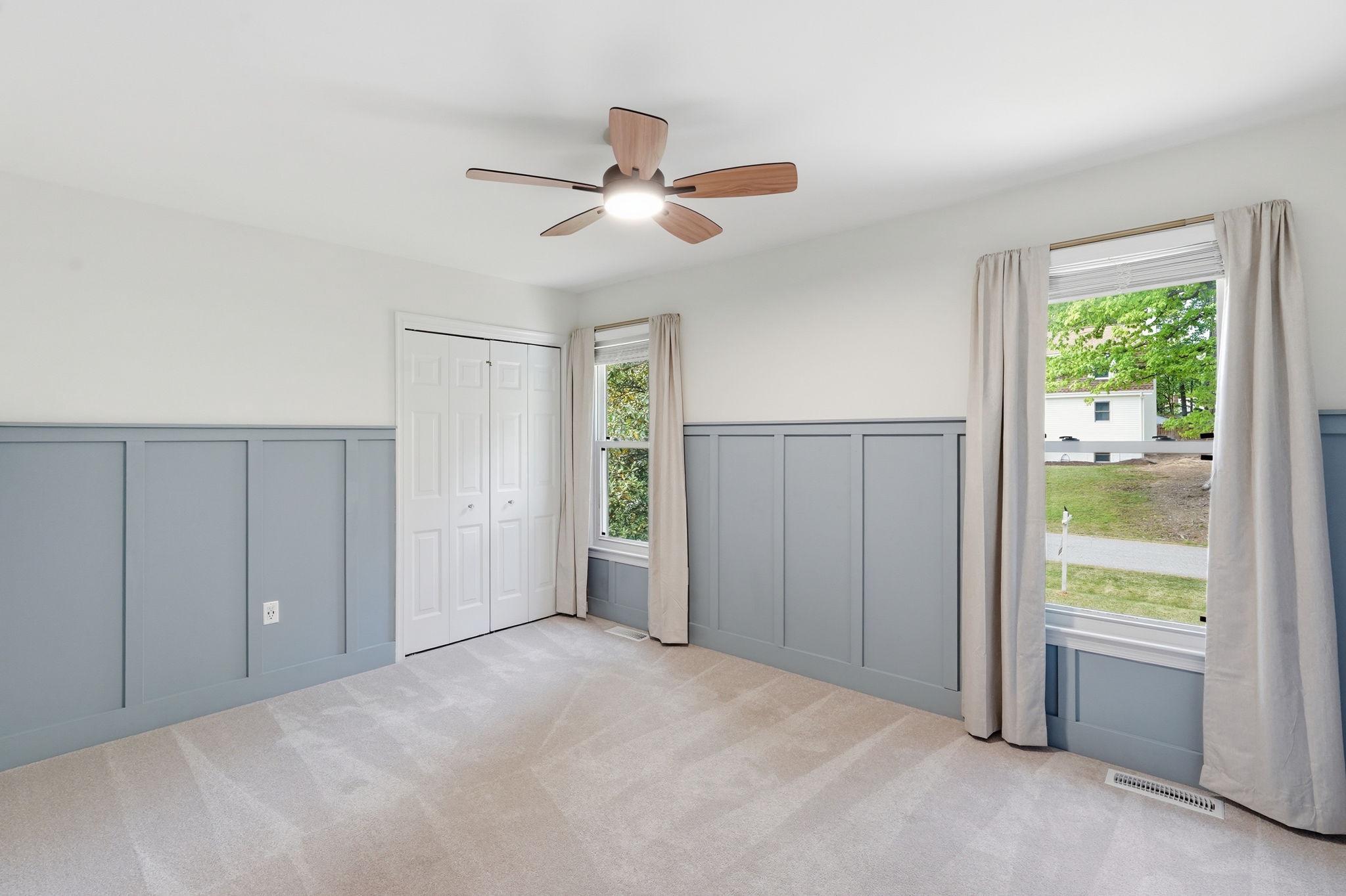 124 Oaklawn Road Stafford, VA 22554 - Photo 28 of 36 a view of a livingroom with a ceiling fan & windows
