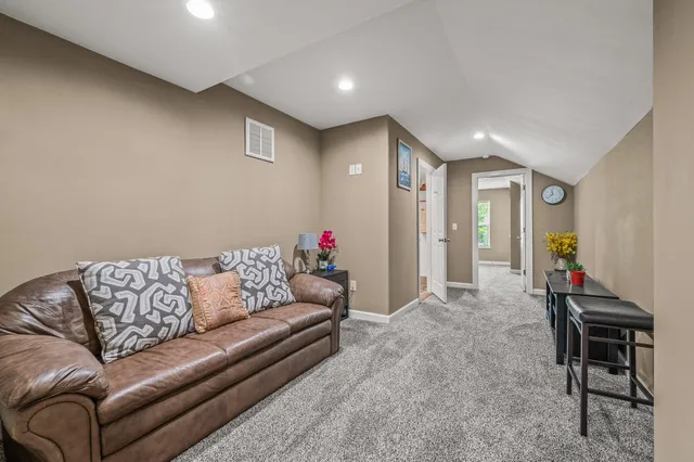 a view of a balcony with chairs