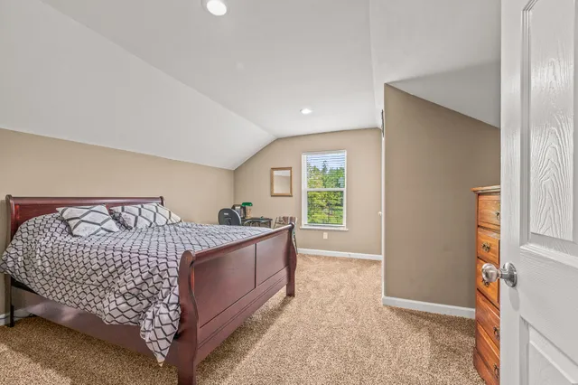 a kitchen with stainless steel appliances granite countertop a refrigerator sink and cabinets