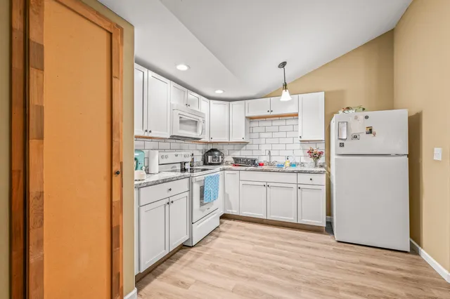 a view of a garden with a lake