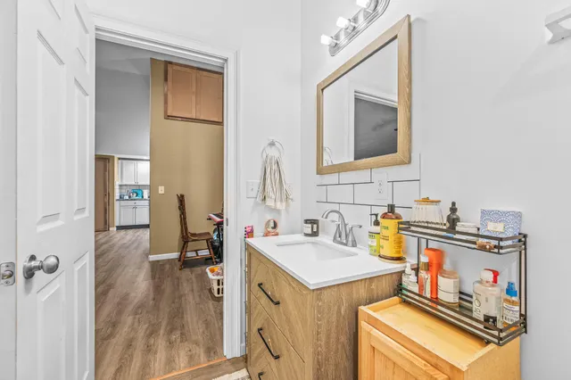 a view of a lake with houses in the back