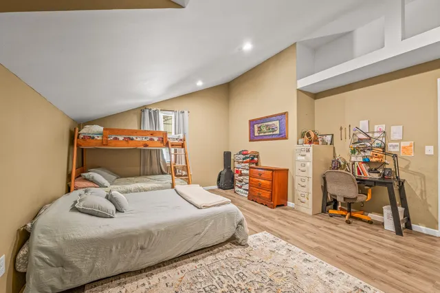 a view of a patio with table and chairs and potted plants