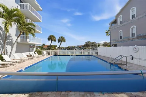 a swimming pool with an outdoor space