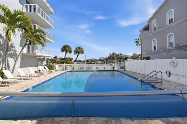 a swimming pool with an outdoor space